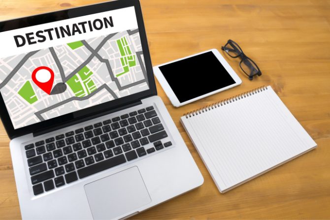 AI in logistics is used for route optimization. A computer with a map on it.